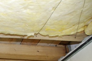 Securing mineral wool with wire Securing mineral wool with wire