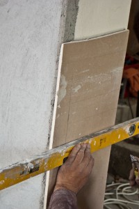 Cutting the drywall to make it bend