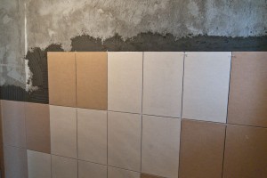 Installing wall tile in bathroom