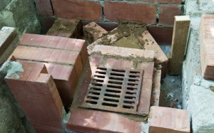 Outdoor stove 3839 Continuing installing the bricks in the stove firebox