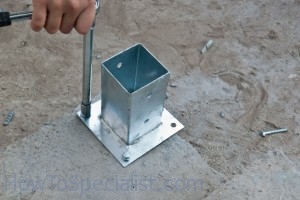 Installing post anchor Installing post anchor
