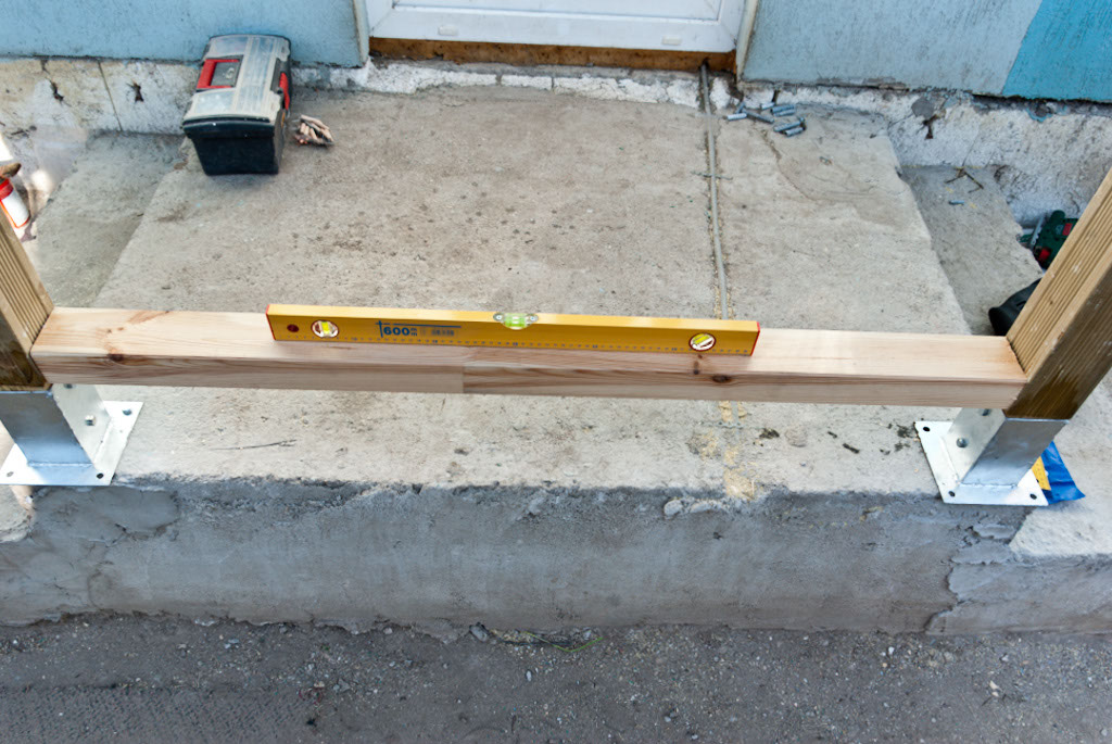 Installing the bottom rail using a level