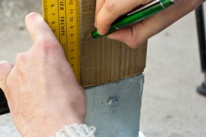 Marking on deck post the top edge of the bottom rail Marking on deck post the top edge of the bottom rail