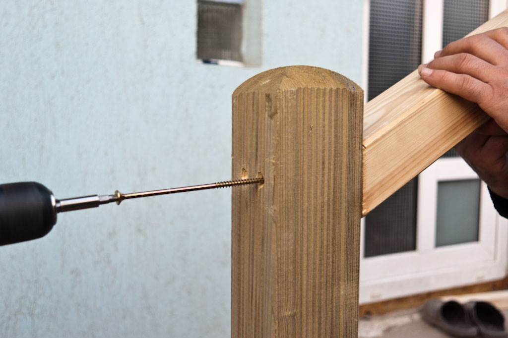 Fastening handrail with screws