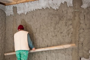 Cement rendering a wall Cement rendering a wall
