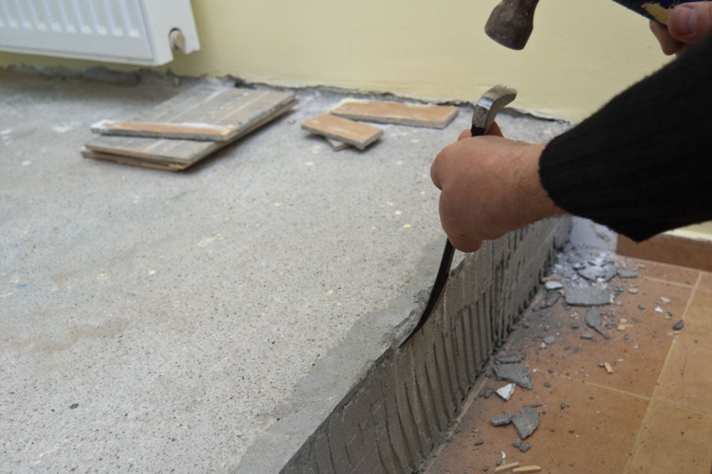 Removing wall tile adhesive