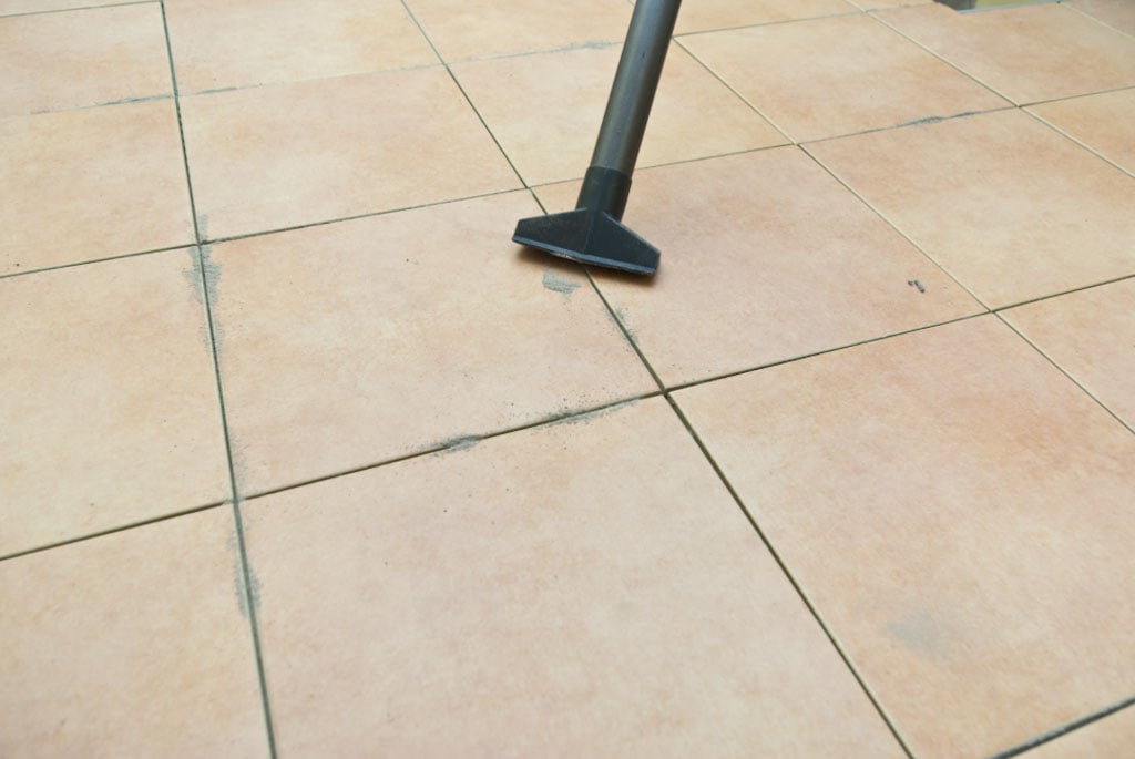 Cleaning the floor tiles