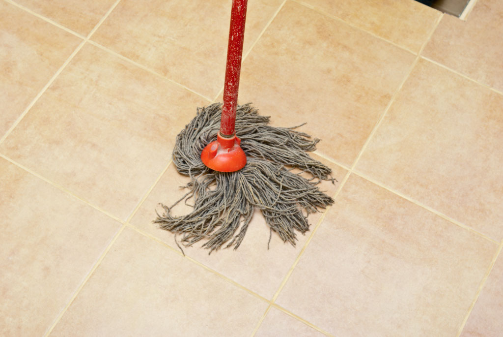 Cleaning floor tile