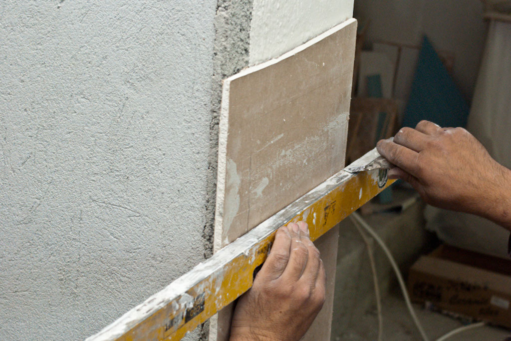 Scoring drywall with an utility knife