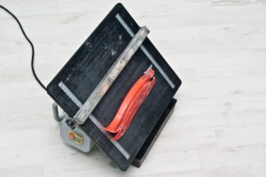 Making angle cuts with a wet saw