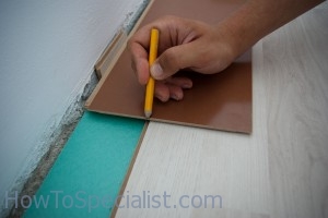 Making marks on laminate boards