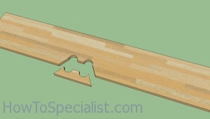 Cutting laminate flooring around pipes