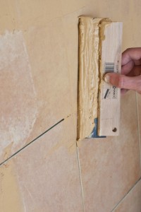 Grouting wall tiles with a float Grouting wall tiles with a float