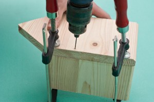 Drilling pilot holes before driving in the nails
