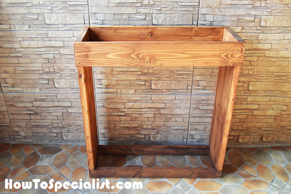 Staining-the-firewood-rack