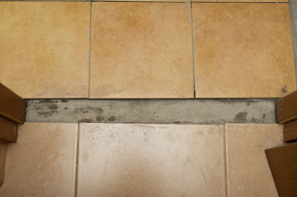 How To Install Tile Transition, How To Install A Threshold On Tile Floor